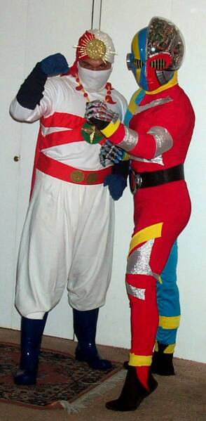 J.T. as Rainbow Man and Pomai as Kikaida